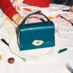 Продажи Mulberry растут, убытки увеличиваются в первом полугодии из-за операционных инвестиций